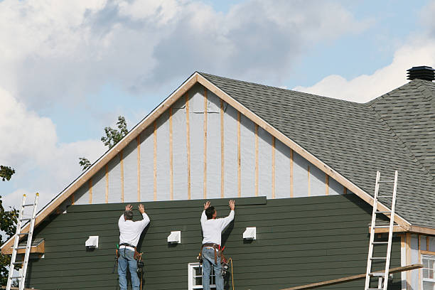 Professional Siding Repair technician working in Rising Sun, IN